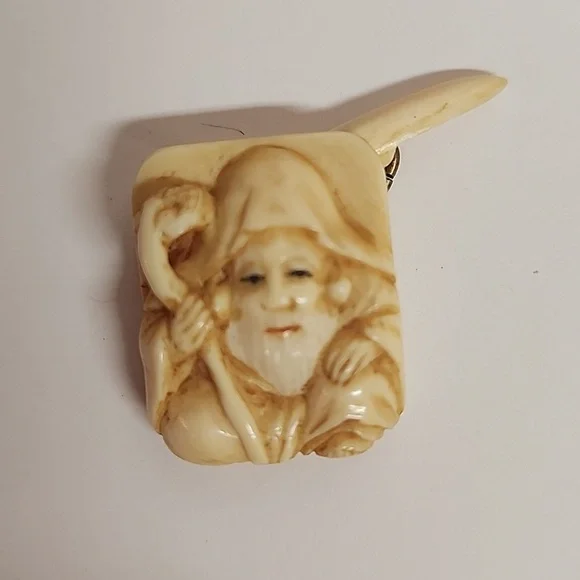 Vintage cream intricate bearded man holding staff cufflinks.Rare find. Unique.